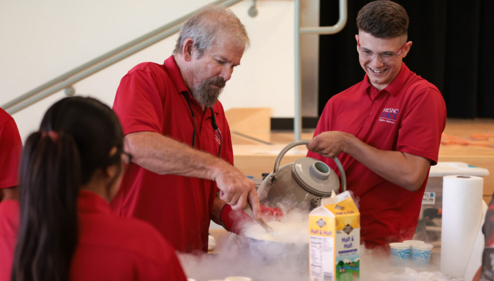 Physics Outreach Director Donald Williams demonstrates how to make ice cream using liquid nitrogen.